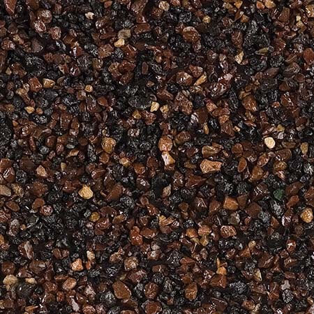 Крупний план композитної черепиці Gerard Shake Chestnut, що показує глибокий коричневий колір та фактуру Фрагмент листа Gerard Shake Chestnut з рельєфною текстурою